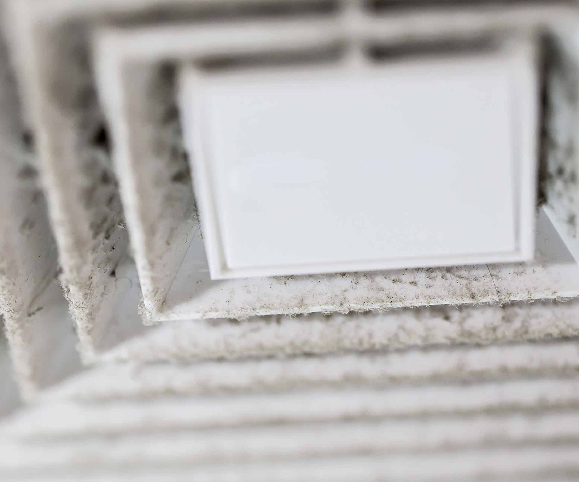 Zoomed in view of dirty HVAC in need of air duct cleaning